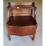 An early 19th Century mahogany serpentine front night Commode with hinged upper shelf and seat