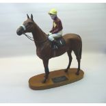 A Beswick Model of Red Rum with Brian Fletcher up, from the Connoisseur Horses Series, No. 2511.