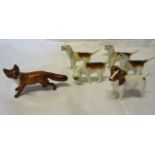 Four Beswick Fox Hounds, a Beswick fox and a Jack Russell Terrier