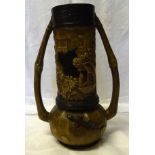 A Bretby Art pottery two handled Vase decorated with incised Oriental figures and with applied