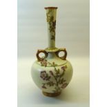 A Victorian Royal Worcester two handled baluster Vase painted with sprays of flowers with gilded