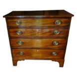 A small George III mahogany Chest of four long graduated Drawers with ivory key plates, oval brass