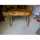 An early 19th Century mahogany side Table with single frieze drawer on square tapering supports.