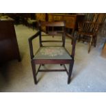 A 19th Century mahogany frame Elbow Chair with bar back reeded arms and drop in seat on reeded