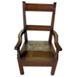 A child's 19th Century Commode Elbow Chair with bar back and hinged seat.