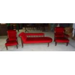 A late Victorian mahogany frame Chaise Longue, upholstered in buttoned red Dralon on turned supports