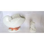 A 19th Century Copeland nautilus shell Spoon Warmer and a small Parian ware figure of a poodle.