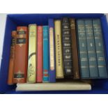 A box of Folio Society Books.