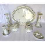 A Limoges seven piece Dressing Table Set comprising tray, covered jars, ring tree, hat pin holder