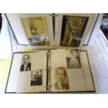 Two folders containing signed Photographs from actors, actresses, musicians and signers.