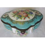 A French porcelain heart shape Casket with hinged lid decorated with panels of flowers on a