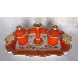 A Continental porcelain Inkstand, the oblong tray of serpentine outline, painted with flowers and