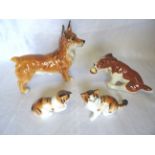 A Royal Doulton Figure of a Corgi, two Royal Doulton Cats, and a Beswick Model of a dog with a ball,