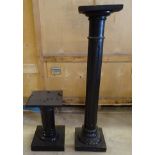 An ebonised fluted column Pedestal on a square base and a smaller similar pedestal.