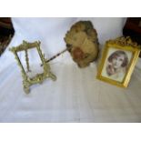 A gilt wood Table Photograph Frame with easel stand, a gilt metal Table Photograph Frame, and a