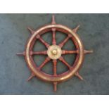 An Early 20th Century oak and brass banded eight spoke Ships Wheel inscribed "Brown's Patent