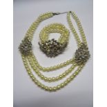 A double strand simulated Pearl Necklace with paste decoration and a matching Bracelet.