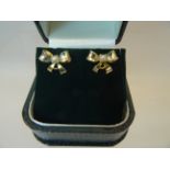 A pair of silver gilt tied bow and pearl Earrings.