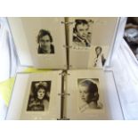 Two folders containing signed Photographs from actors and actresses such as Joseph Fiennes, Kevin