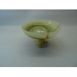 A green onyx circular Bowl with variegated pattern on a pedestal foot, 8" (20cms) diameter.
