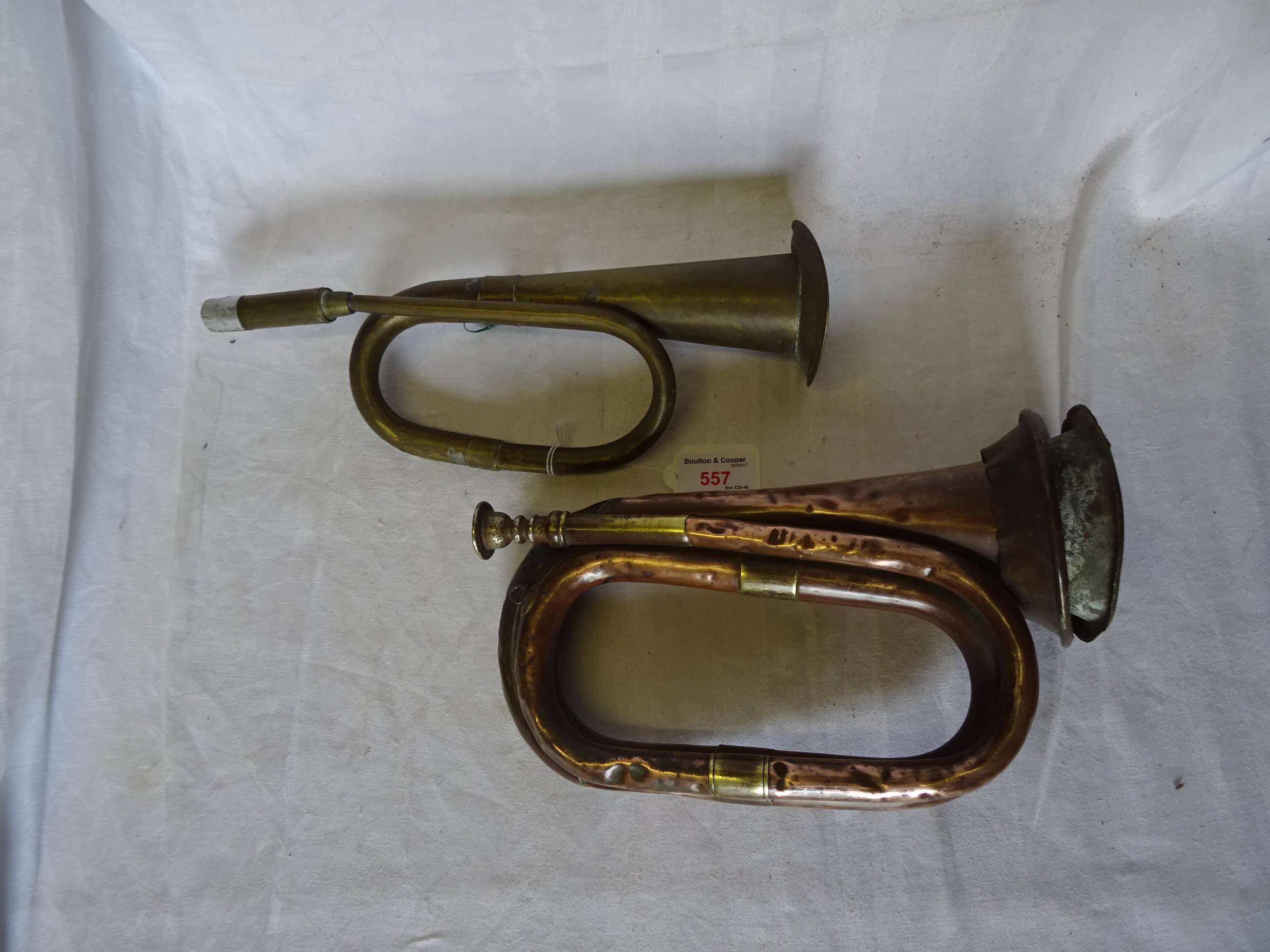 A copper Military Bugle and one other. (a/f)