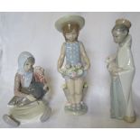 A Lladro Standing Figure of a girl holding flowers, another holding a lamb, and a Seated Figure with