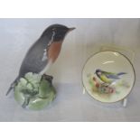 A Royal Copenhagen Figure of a perched Robin, No. 1516 and a Royal Worcester trinket box and cover