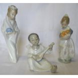 A Lladro Figure of girl wearing a crown, another holding a bowl of fruit and a Lladro angel.