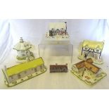 A Coalport Model of "The Village School", another "Christmas Cottage", three others (cracked), and a