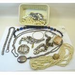 An oval Locket on a link guard Chain, paste set Buckle and items of costume jewellery.