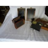 A box containing a wooden Stereoscopic Viewer, two folding Cameras, glass Camera Plates, etc.