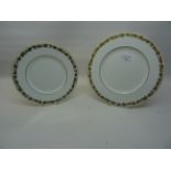 A Wedgwood Dinner Service decorated in the Whitehall pattern with a border pattern of trailing
