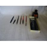 A Parker Fountain Pen and other calligraphy items.