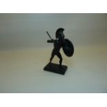 A small 19th Century Bronze Figure of a Greek warrior holding a spear and shield and on an oblong