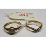 A 9ct gold Dress Ring set with a cluster of small diamonds and a 9ct gold Wishbone Ring set with