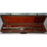 A silver plated Super Monopole Soprano Saxophone by Couesnon & Co. Paris, no. 52491 & 10184, cased.