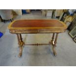 An early Victorian satinwood Writing Table in the style of Gillows, with tooled leather writing