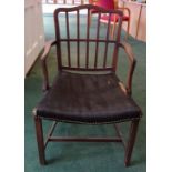 A 19th Century mahogany frame Elbow Chair with rail back, upholstered seat and square supports