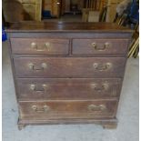 An 18th Century oak Chest of three long and two short graduated drawers with brass swans neck