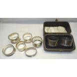 A pair of silver Serviette Rings, Sheffield, 1932, cased, four Continental silver serviette rings