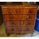 A Victorian mahogany Chest of three long and two short drawers with turned pull handles and turned