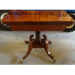 A Regency mahogany Tea Table with folder over top, on turned centre column and quartette splay