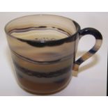 A 19th century Continental agate Cup with loop handle. 2 1/4" (6cms) high.