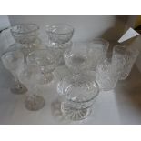 A set of six cut glass Grapefruit Dishes, glass flutes and other glassware.