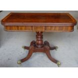 A Regency mahogany Tea Table with fold 'D' shape top, with cross banded decoration on a baluster