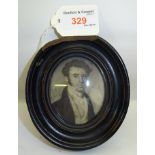 A 19th Century miniature oval Portrait on ivory of the head and shoulders of a young man with