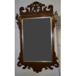 A Georgian design upright Wall Mirror with bevelled plate, gilt slip and fret carved mahogany