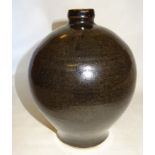 A Studio pottery black glaze baluster Vase by Alan Stuttle. 9" (23cms)