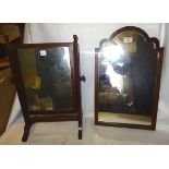 A small 19th Century upright swing Toilet Mirror in mahogany frame and skeletal stand and wall