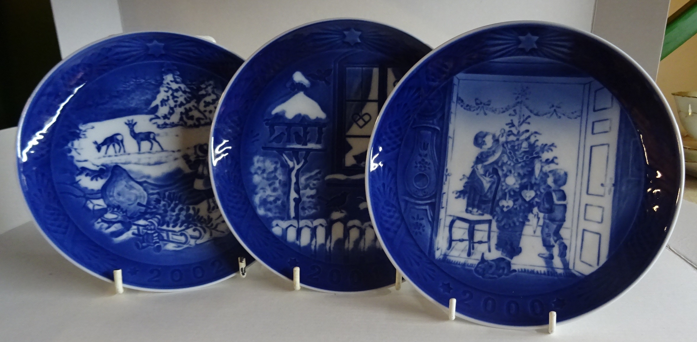 A collection of thirty two Royal Copenhagen Christmas Plates from 1971-2002.